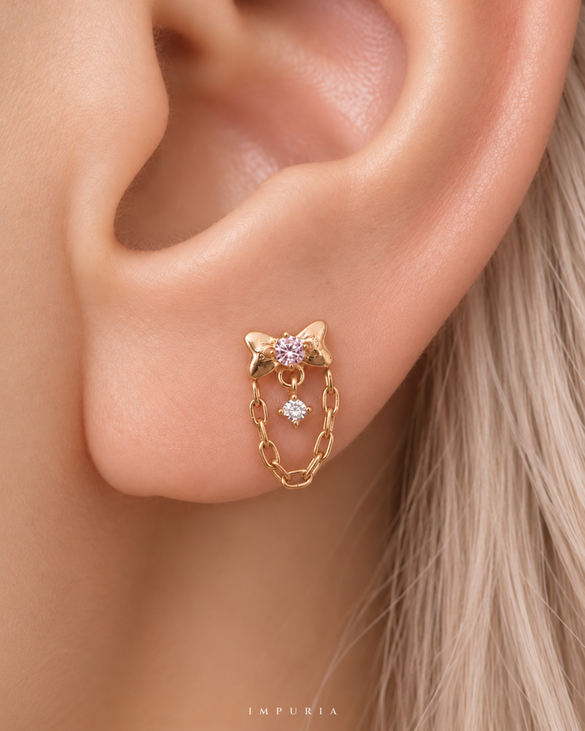amour coquette bow chain flat back stud earring 16G on lobe piercing