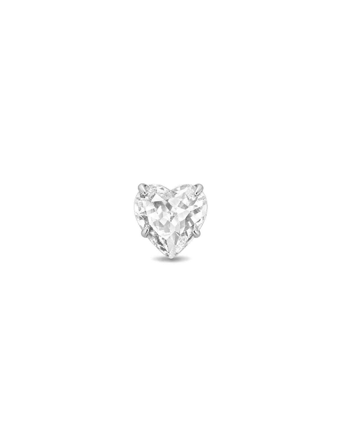 A heart-shaped clear gemstone stud earring set in a silver-toned metal prong setting, centered on a solid white background.