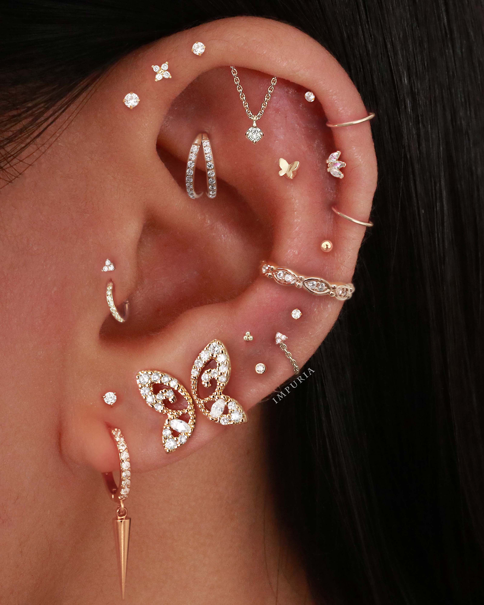 Pretty Butterfly Multiple Ear Piercing Ideas for Women - www.Impuria.com #earpiercings