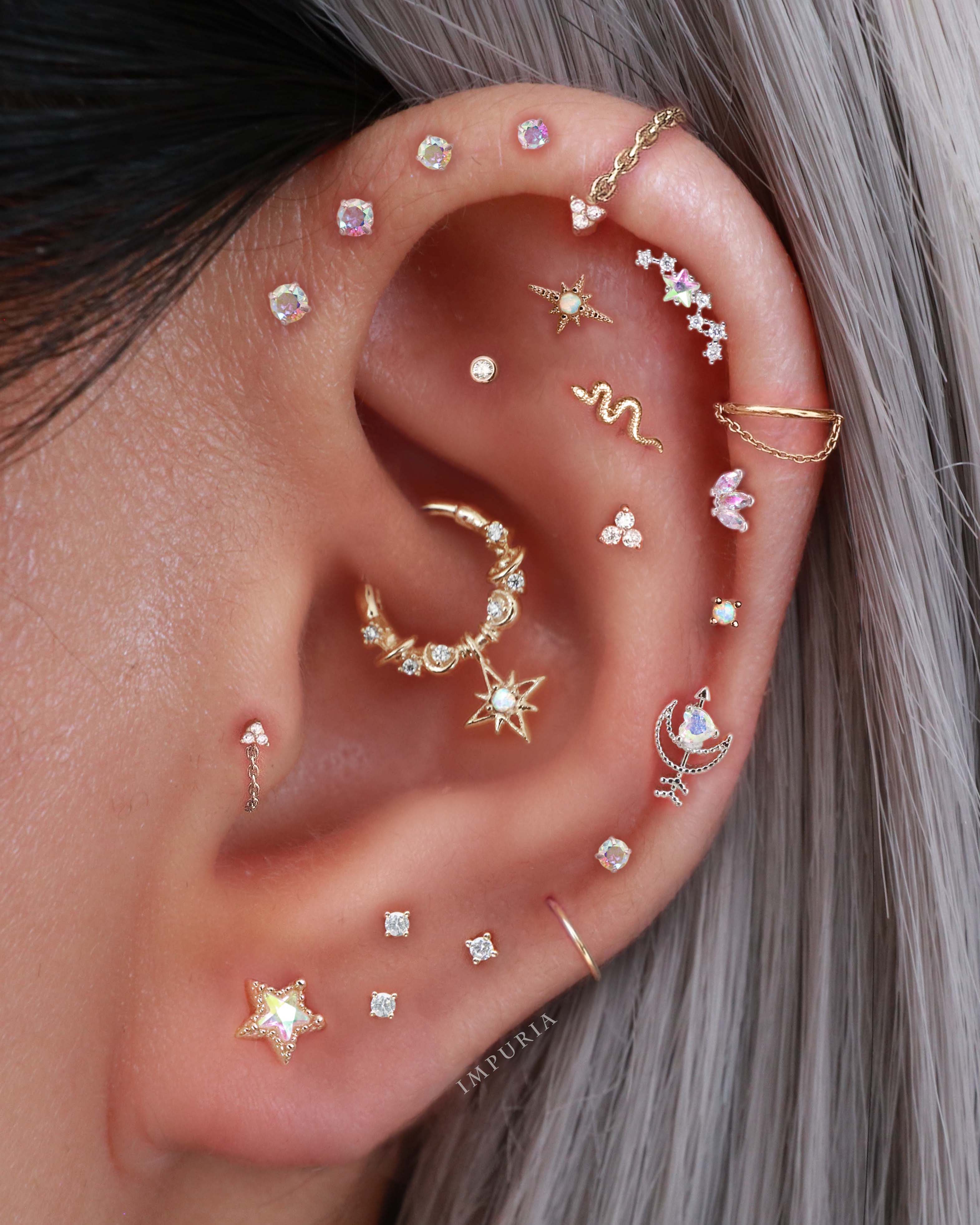 pretty aurora borealis ear piercing cartilage earring stud beautiful ear curation piercing ideas for women - www.Impuria.com