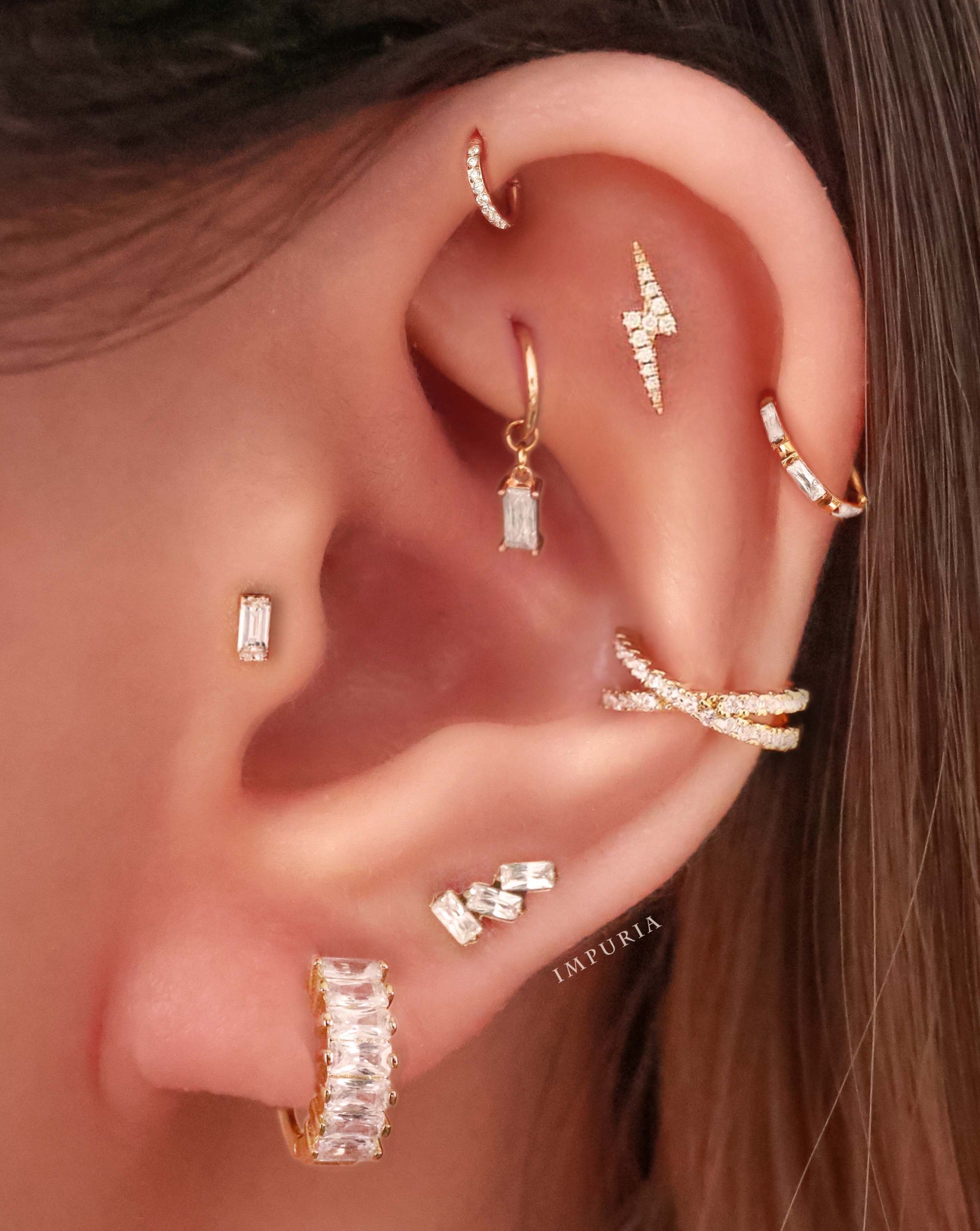Cute multiple ear piercing curation ideas for women - triple baguette cartilage helix lobe tragus earring stud - www.Impuria.com