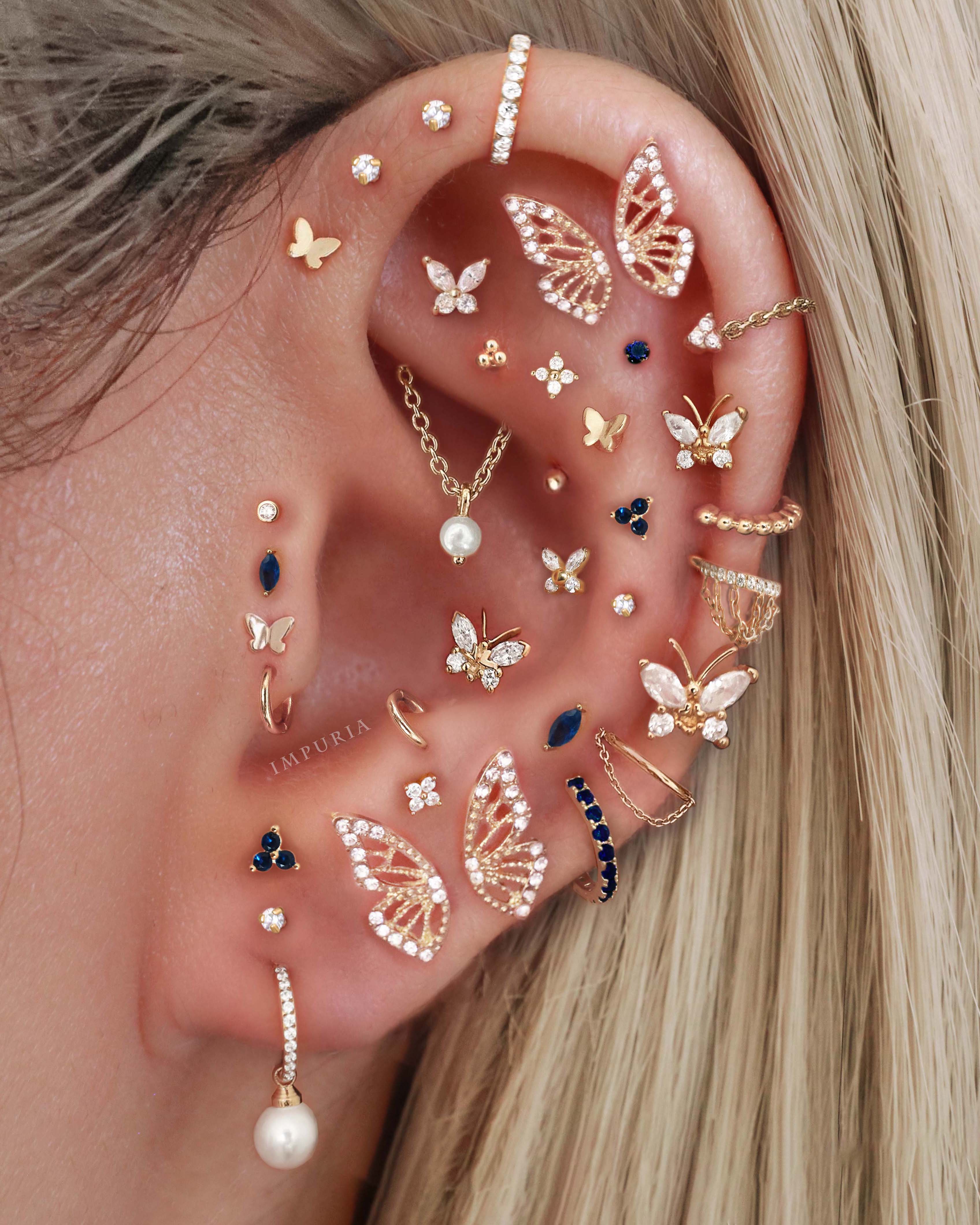 Pretty Multiple Gold Ear Piercing Curation Ideas for Women Trinity Chain Cartilage Earring Stud - www.Impuria.com #earpiercings