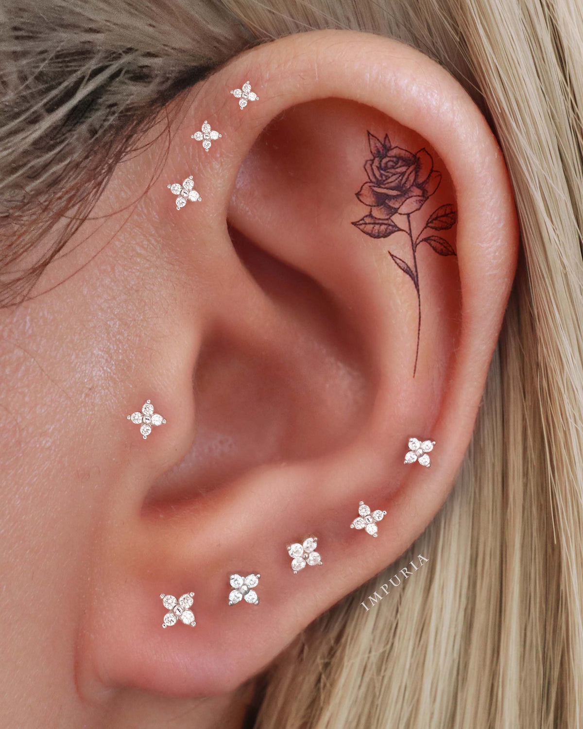 All the way around ear piercing curation ideas clover cartilage earring studs for women - www.Impuria.com #earpiercings