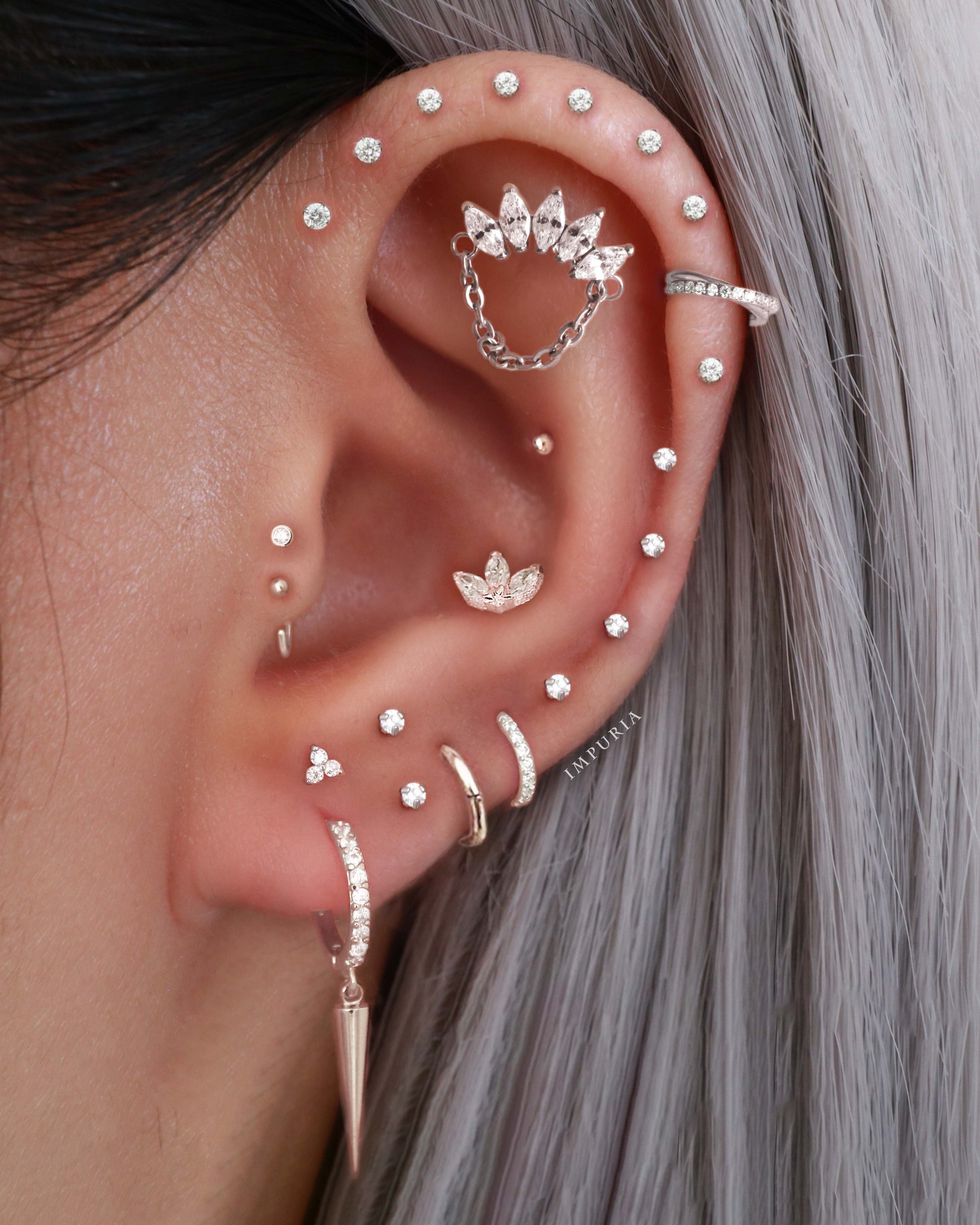 Edgy Multiple Ear Piercing Curation Ideas for Women Silver Cartilage Crystal Earring Studs 16G - www.Impuria.com #earpiercings