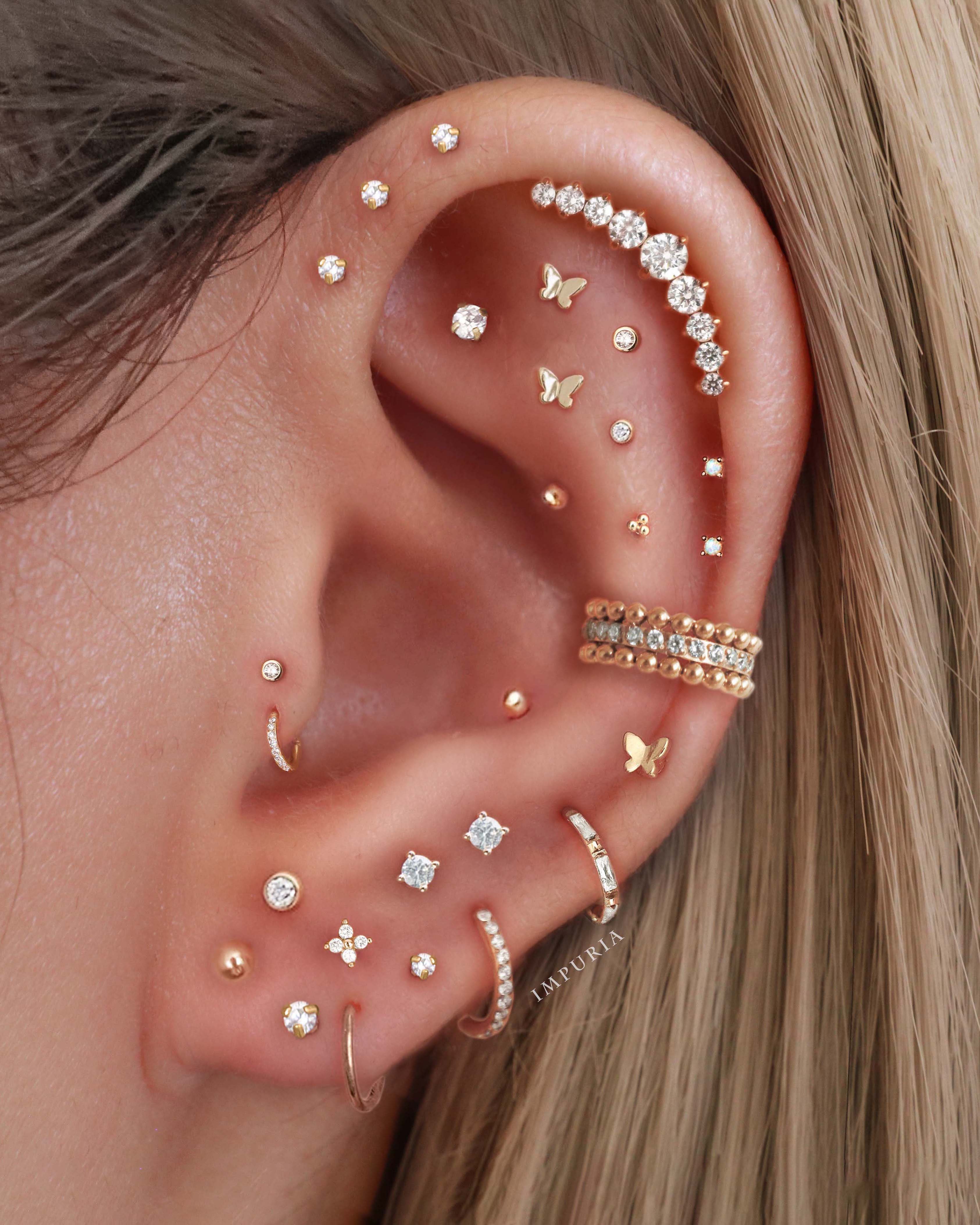 Pretty Multiple Ear Piercing Curation Ideas for Women Gold Cartilage Earring Ring Hoop Clicker 16G - www.Impuria.com #earpiercings