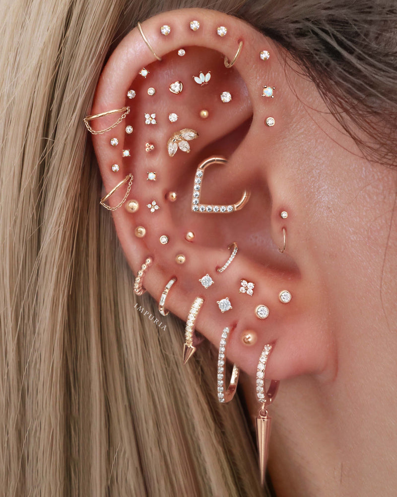 Multiple Ear Piercings On One Ear Ear Piercing Ears Ears Pierced