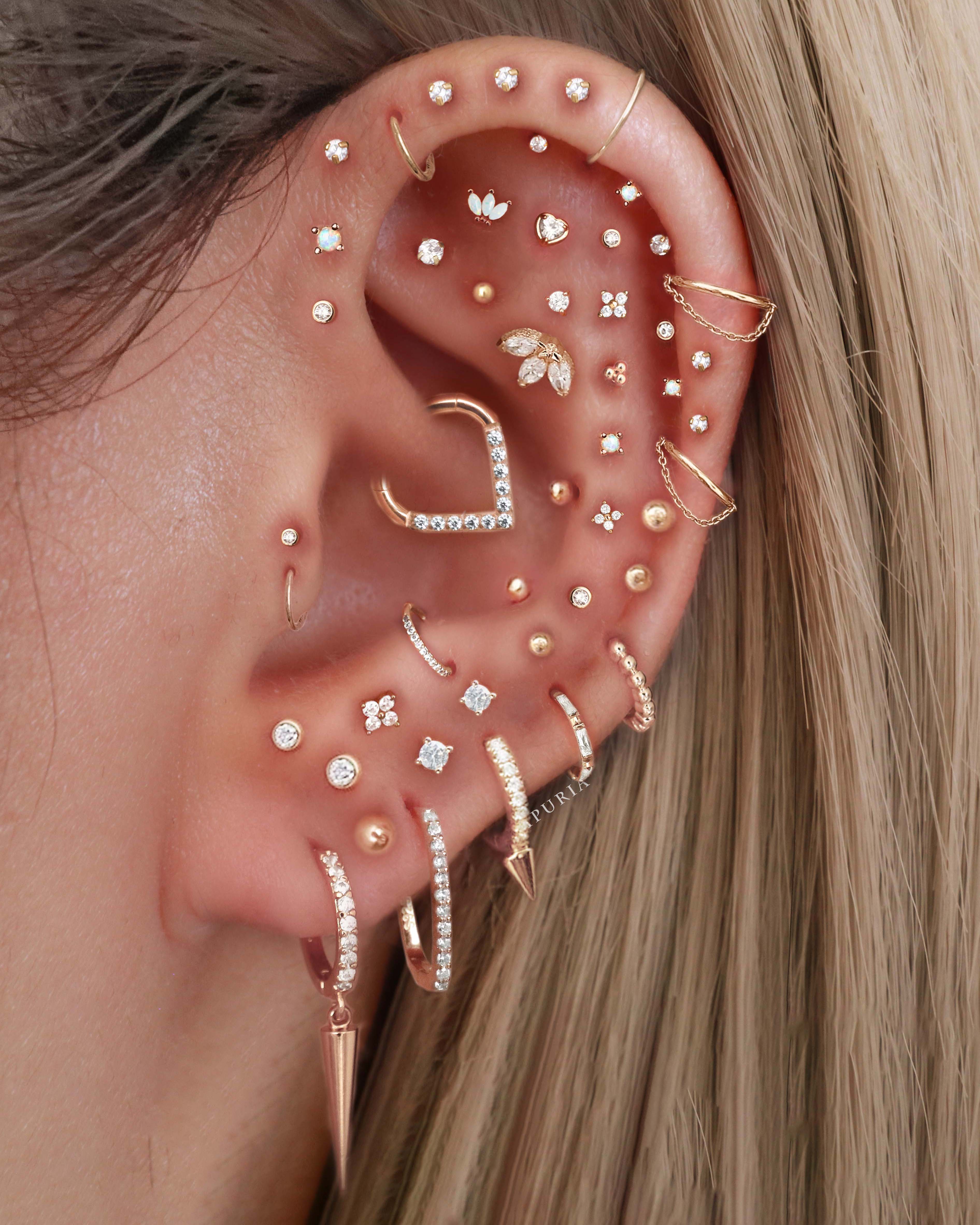 Edgy Stacked Multiple Ear Piercing Ideas for Women Cartilage Earrings Stud 16G - www.Impuria.com #earpiercing