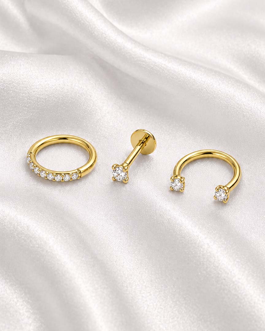 Minimalist ear stack with flat back stud earrings and helix hoop and horseshoe barbell, Essential Ear Stack Capsule by Impuria jewelry in silver