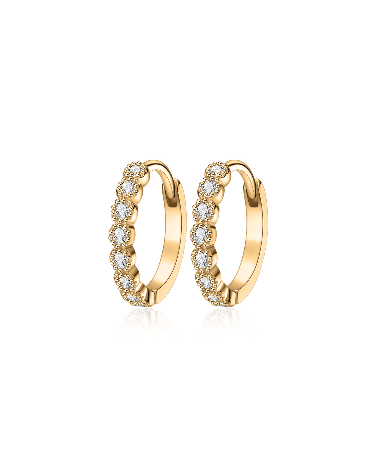 A pair of gold huggie hoop earrings adorned with a row of clear round-cut gemstones, set against a clean white background.