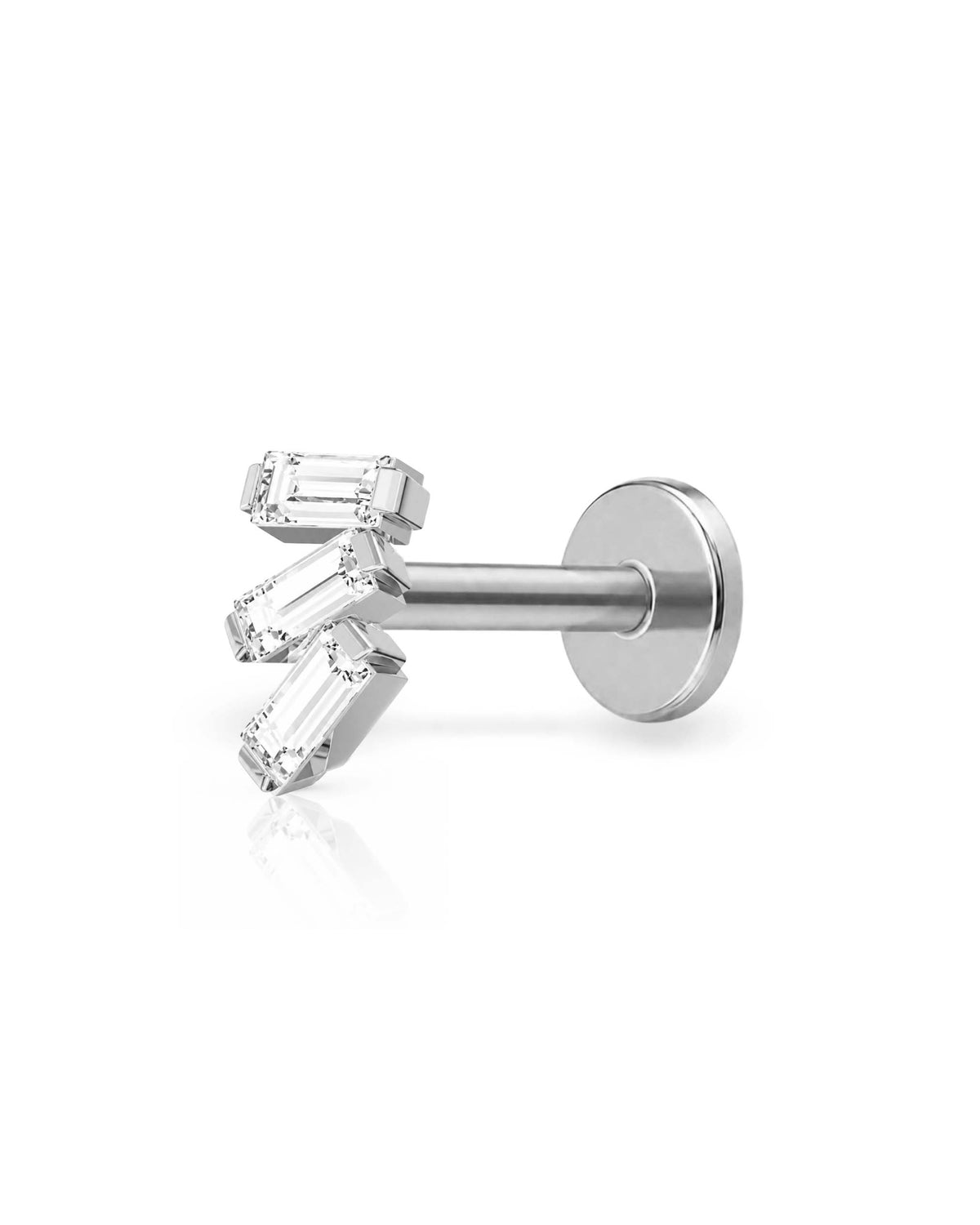 A silver-colored labret stud earring featuring three baguette-cut clear gemstones in a fan-like arrangement, shown on a clean white background with a soft reflection.
