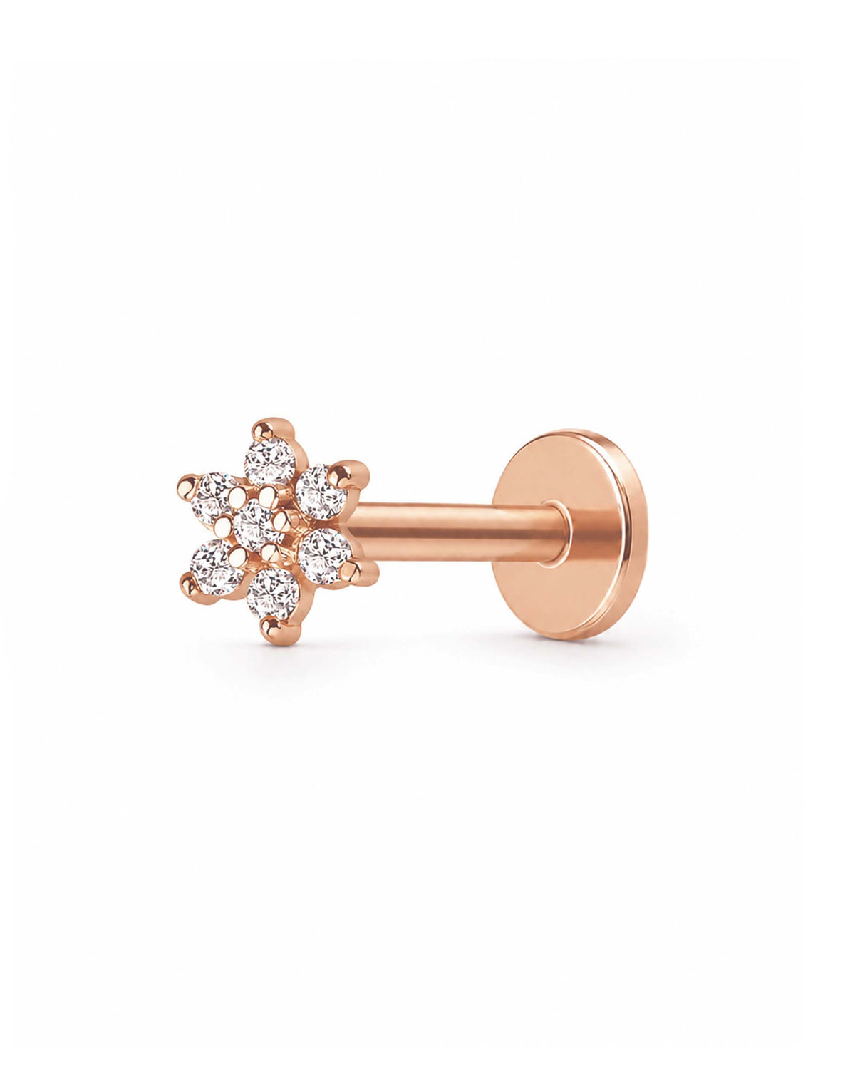 A rose gold flat-back labret stud earring featuring a small cluster of clear round-cut gemstones in a floral snowflake-like design, shown from a side profile on a clean white background.