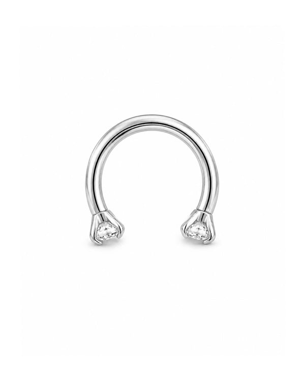 A silver-toned U Hoop horseshoe barbell earring with two small  clear gemstones at the ends, shown on a plain white background.