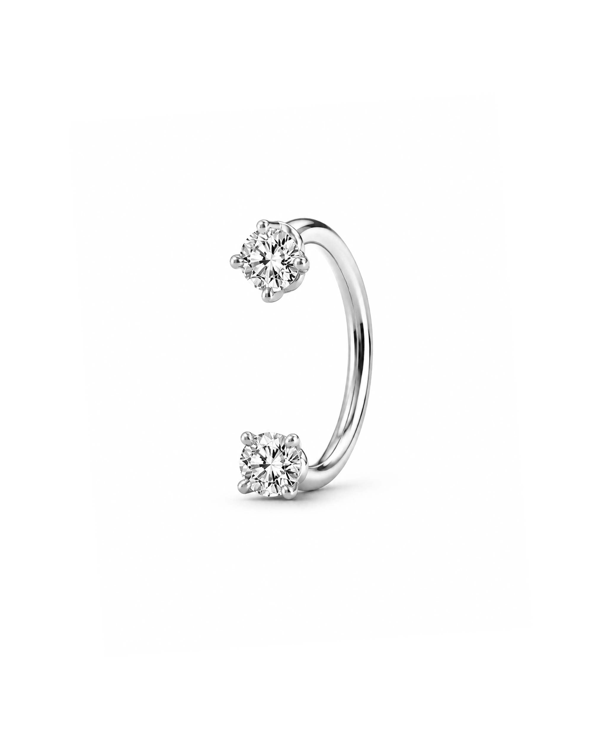 A silver-toned open U Hoop horseshoe barbell earring featuring two round-cut clear gemstones, one at each end, set against a plain white background.
