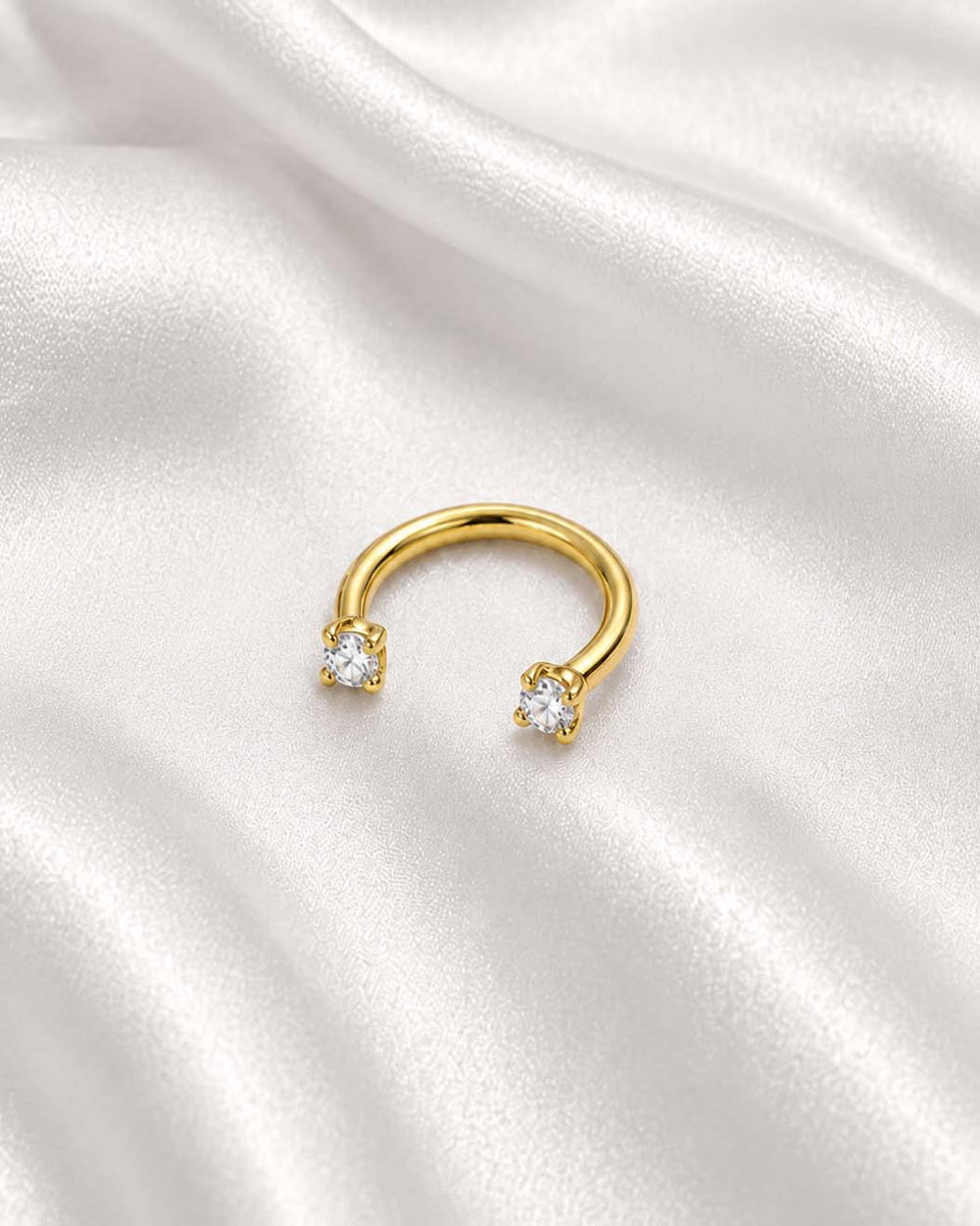 Sparkle Horseshoe Barbell in gold with crystal prong ends for cartilage ear piercings