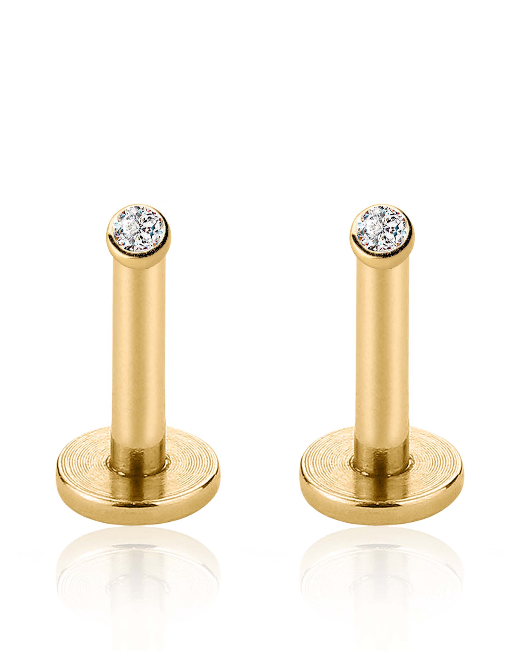 bezel crystal ear studs worn on model’s ear stack