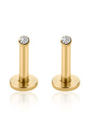 bezel crystal ear studs worn on model’s ear stack