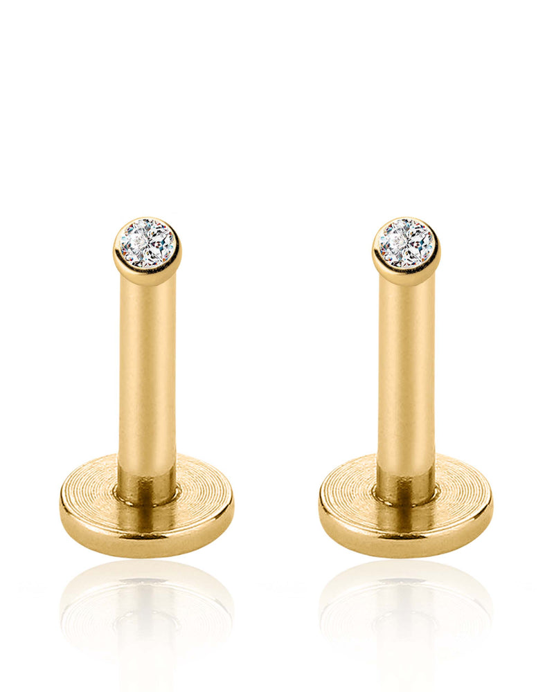 bezel crystal ear studs worn on model’s ear stack