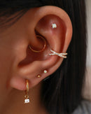 Pretty Multiple Ear Piercing Combination Ideas - Crystal Pave Criss Cross Ear Cuff Earring - www.Impuria.com