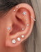 Winter Inspired Curated Ear Piercing Ideas -  Snowflake Cartilage Helix Tragus Lobe Earring Stud - perforaciones en las orejas - www.Impuria.com #earpiercings