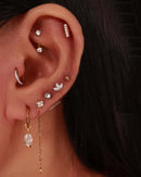 image of ear with simple bar helix flat back earring stud