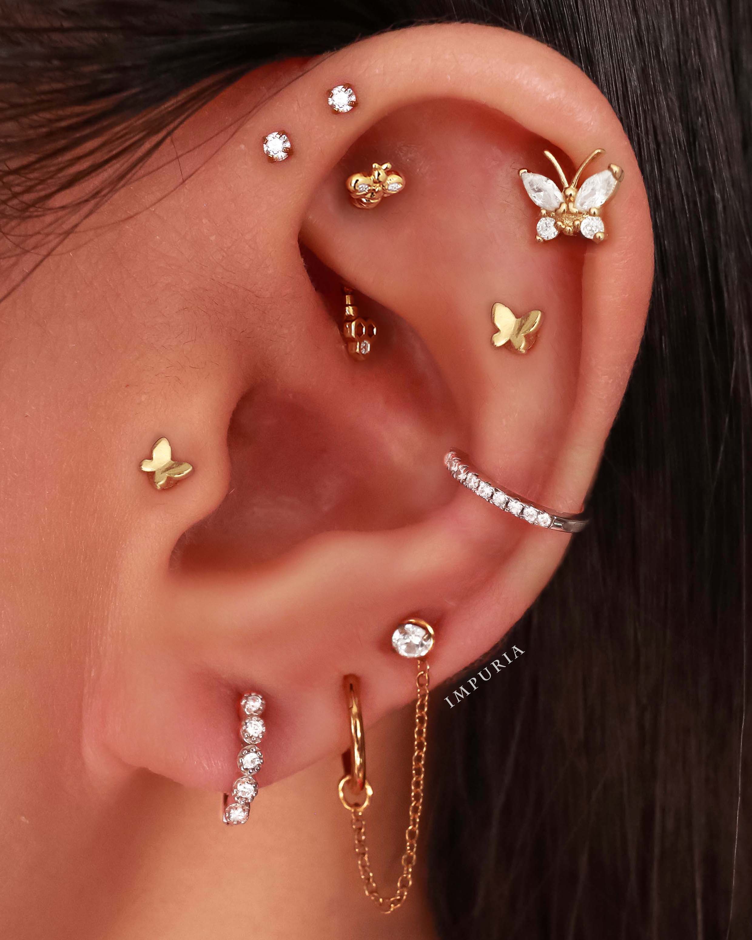 Cute Butterfly Ear Piercing Ideas Crystal Pave Cartilage Helix Tragis Conch Earring Ring Hoop - lindas ideas para perforar la oreja - www.Impuria.com #earpiercings 