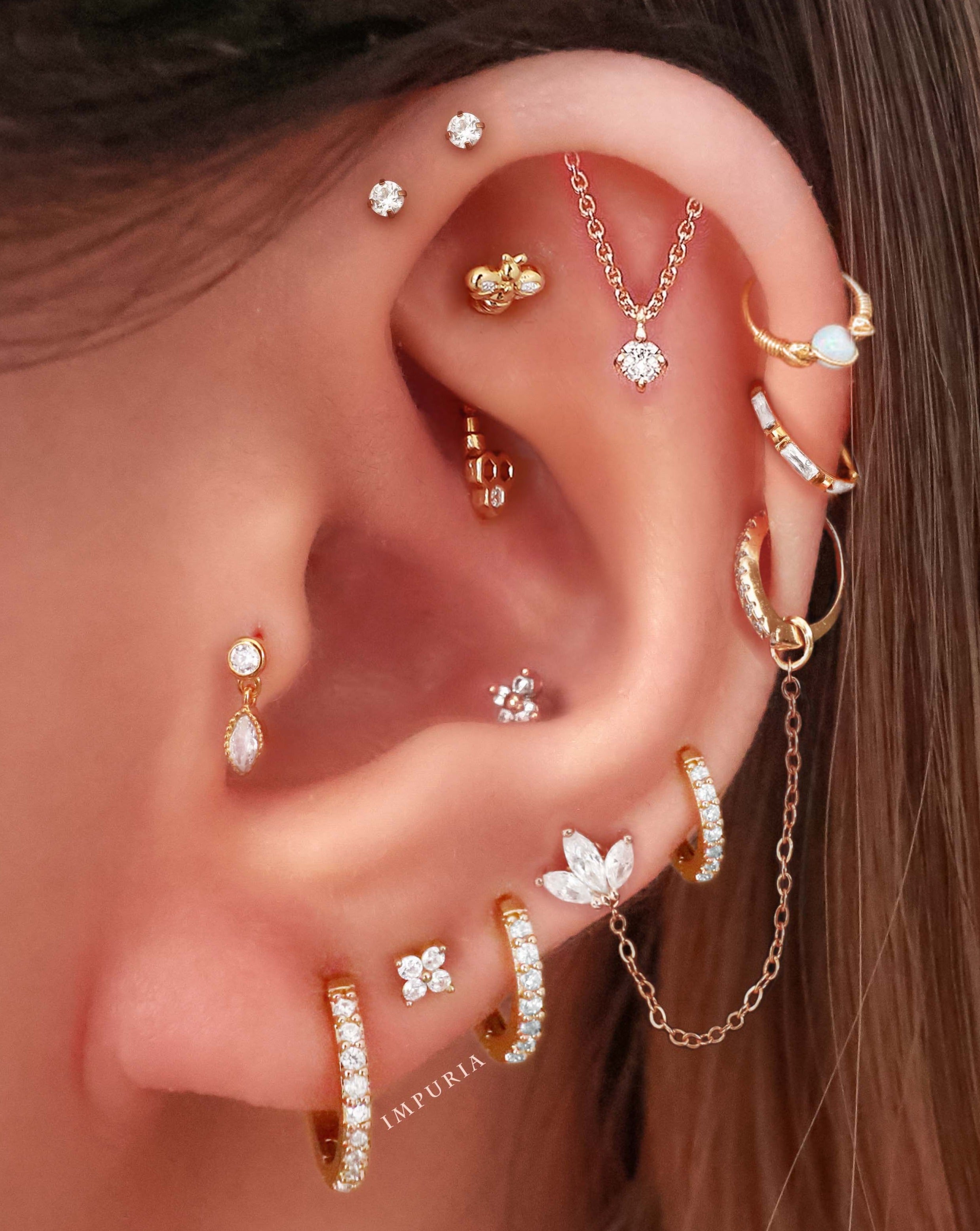 Cartilage Earring Stud Jewelry Multiple Ear Piercing Ideas - Ideas para perforar la oreja - www.Impuria.com #earpiercings 