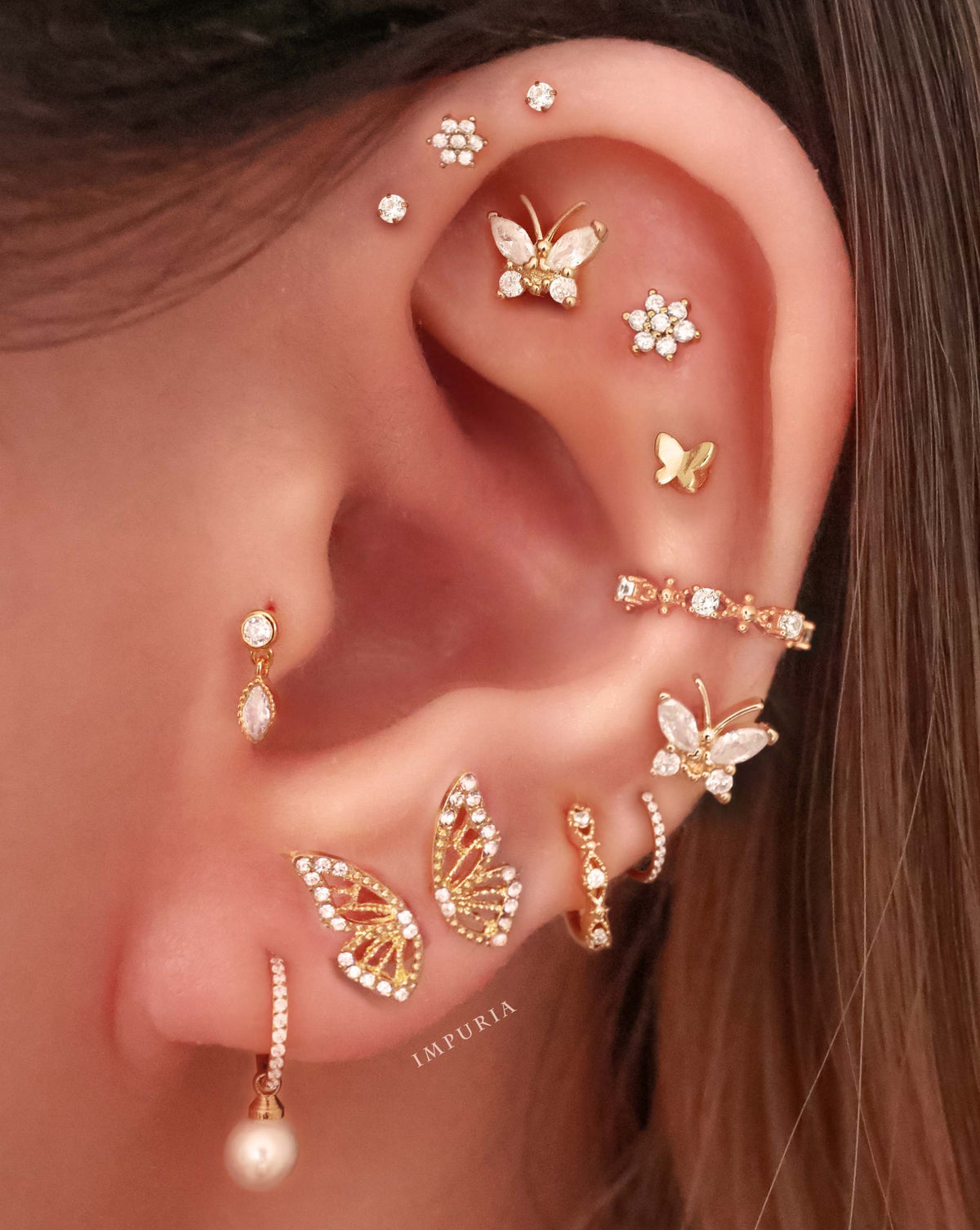 Cute Butterfly Ear Piercing Curation Placement Ideas for Women - ideias para piercing na orelha - www.Impuria.com